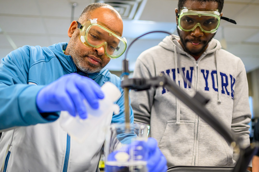 Two Bristol students working together in a lab