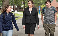 President Douglas and students walking