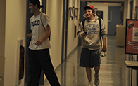 students walking down hallway